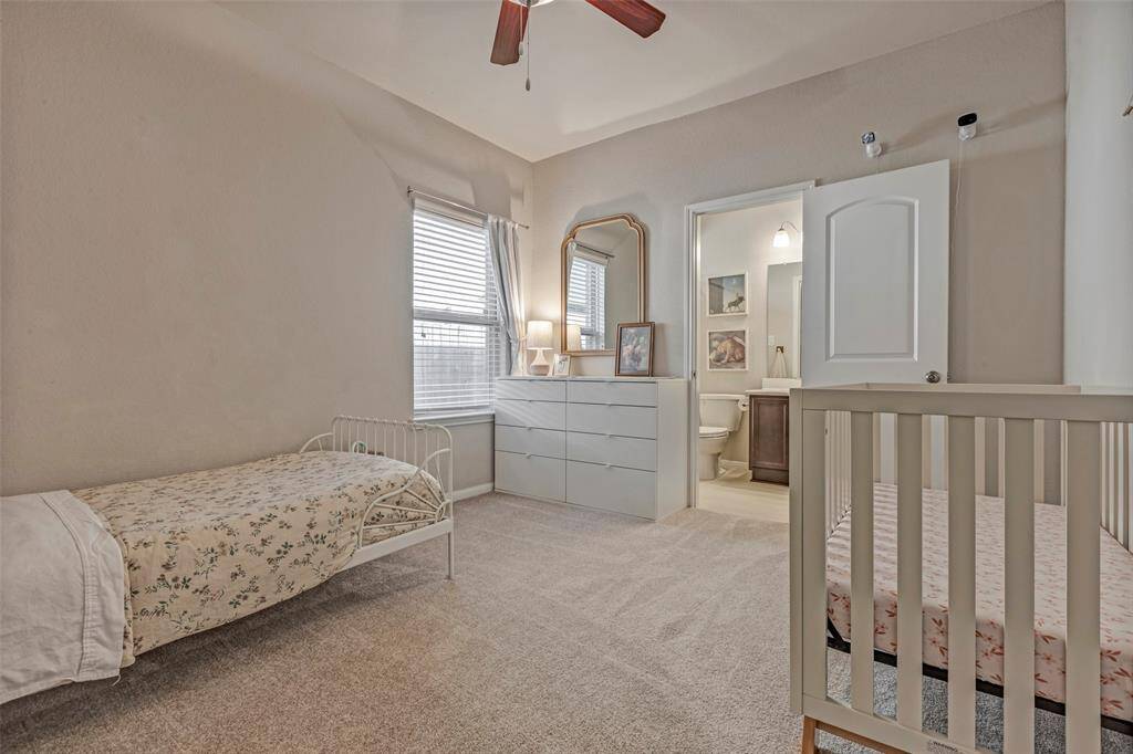 The guest suite features an en suite bathroom for privacy.