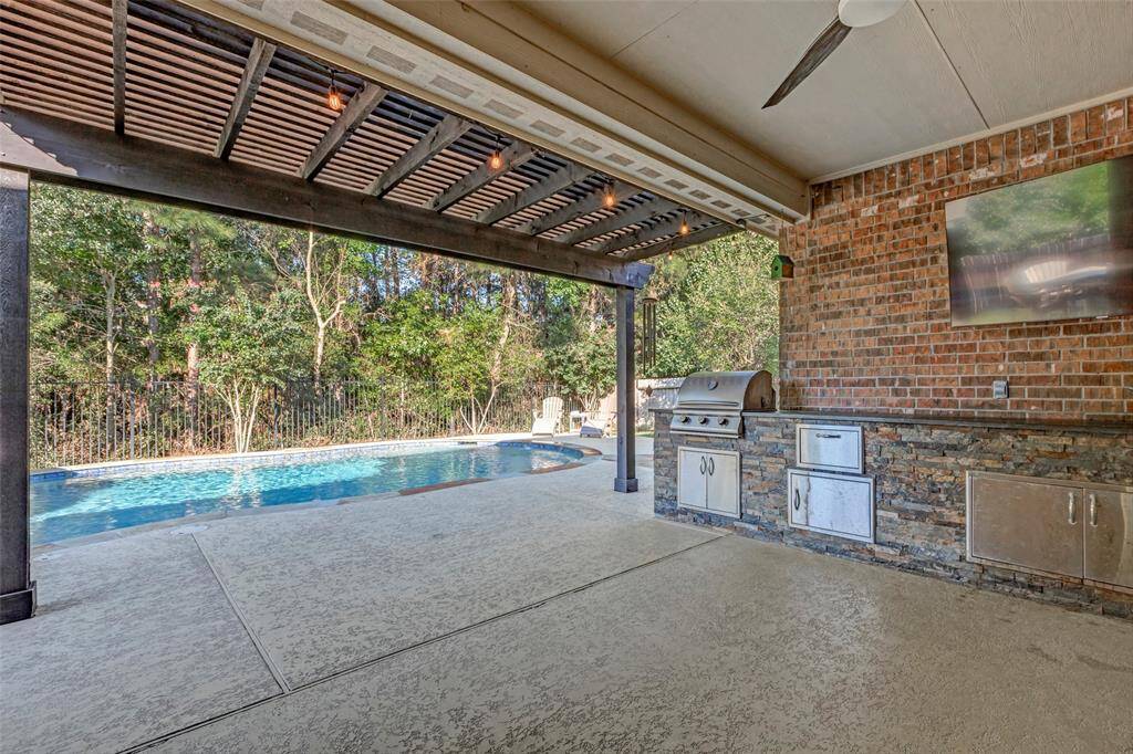 The covered patio was an upgrade and the pergola was added to give you extra outdoor space.