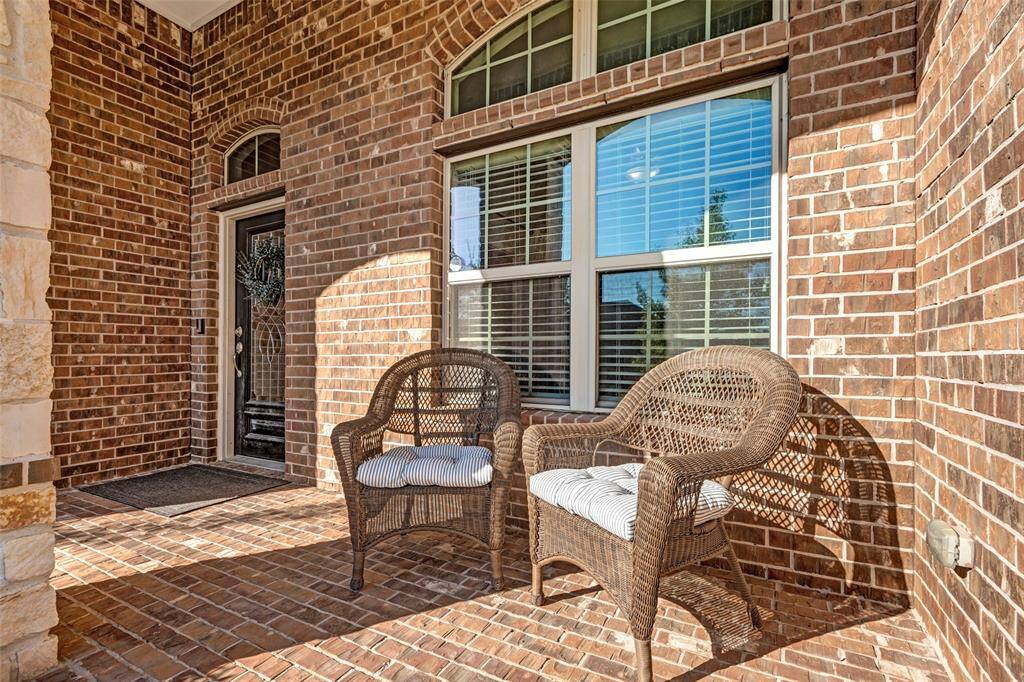 Covered front porch to relax and unwind.