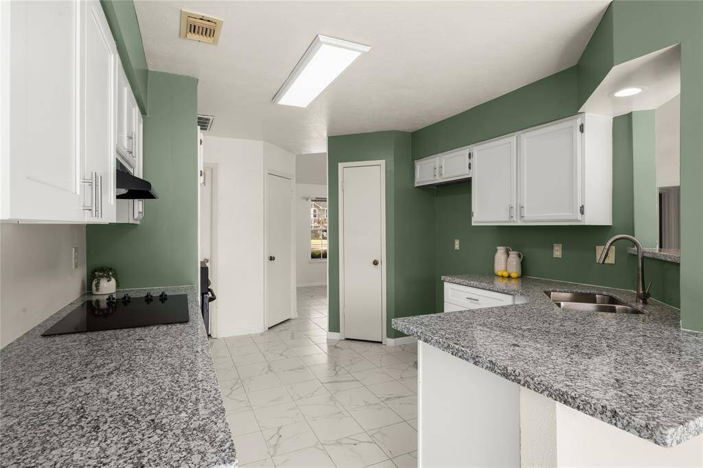 The extensive countertops provide plenty of prep space for your biggest holiday meals. Your jubilant family is patiently waiting to dive into your mouth-watering cuisine.