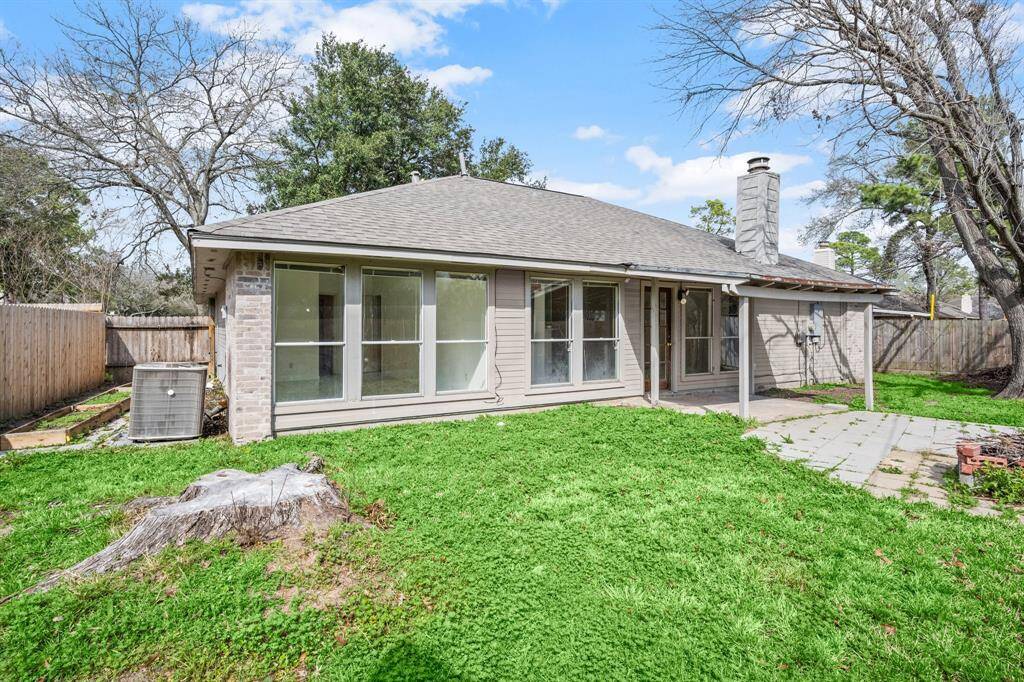 Notice the magnificent roof that was just replaced in 2024 that extends over the patio covering!