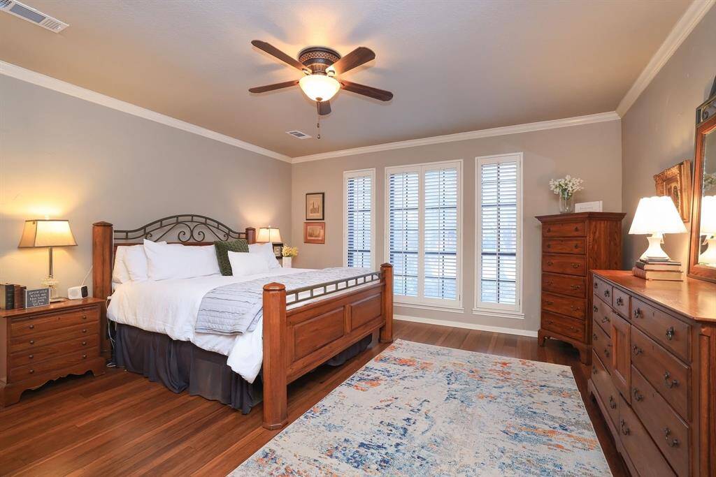 Home is a place of comfort and this owners retreat certainly does that!   Wood flooring, lighting ceiling fan and crown molding had warmth - a space you can uniquely make your own!