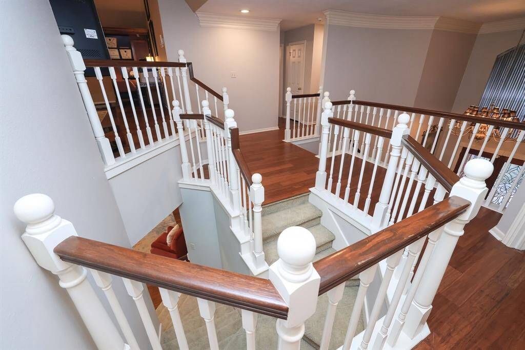 As we move upstairs the beautiful stairwell with decorative carpet treads, there is an abundance amount of space!  Lets talk a look!