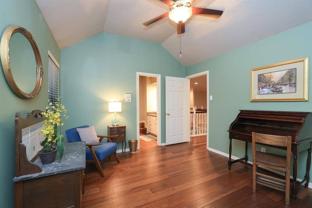 This would make such a pleasant guest room.  Soothing colored walls with heightened ceiling, wood flooring, lighted ceiling fan and walk in closet!  This room also leads into a full sized bath that shares with the gameroom.