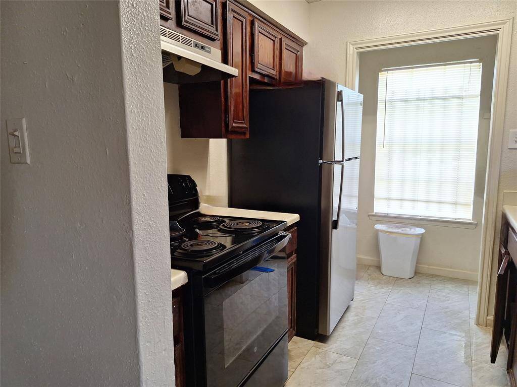Kitchen.  Laundry area at the far end.