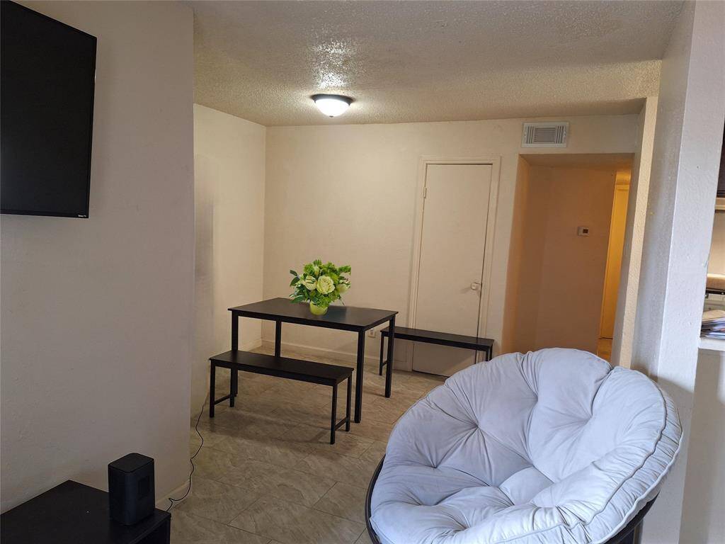 Dining Room. End of Hall: Left - Primary Bedroom and Bath. Right - Full Bath and 2nd Bedroom.