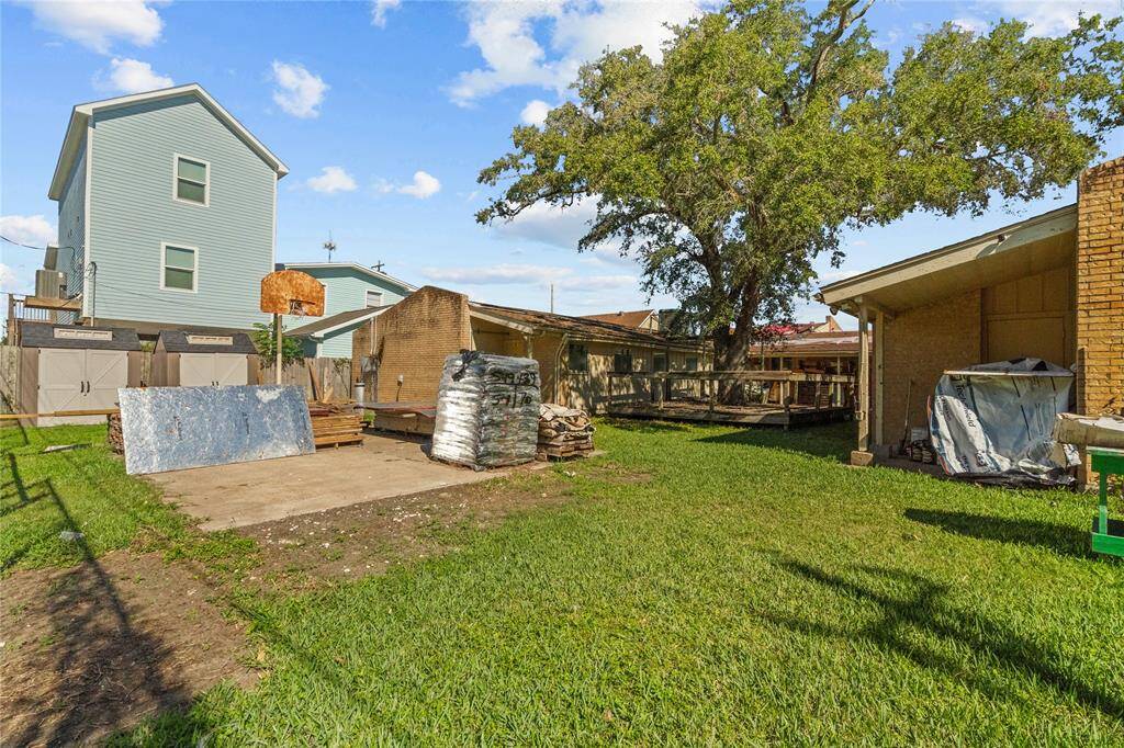 Even with all of the improvements, there is still a green space in this spacious backyard that is perfect for outdoor activities, a garden, and more!