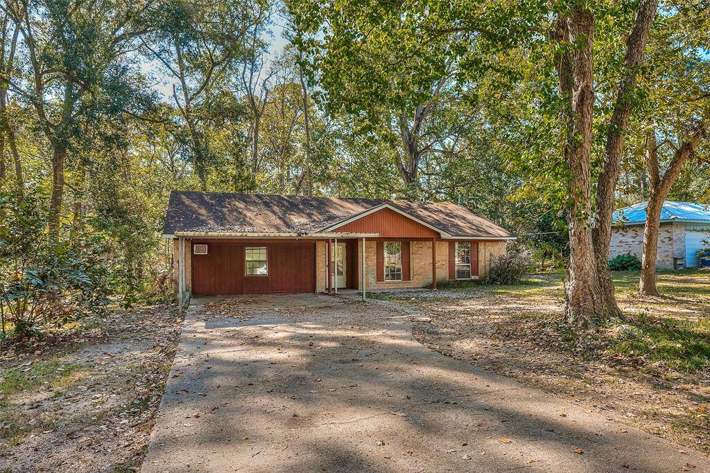 Home is set back in the trees, off the road, on a little over 1/3 of an acre!