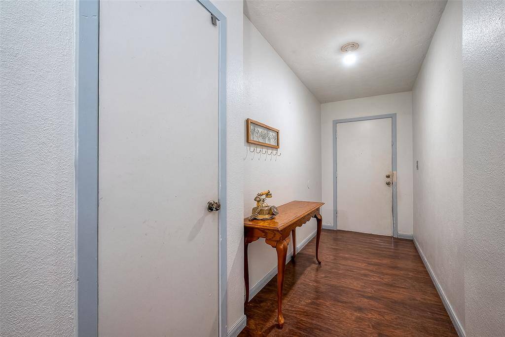 Entry way hall, leading to the living room.