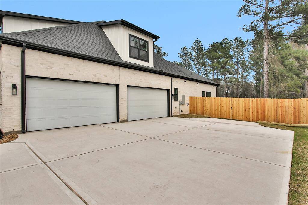 A four-car garage with ample space, neatly organized to highlight storage capacity.