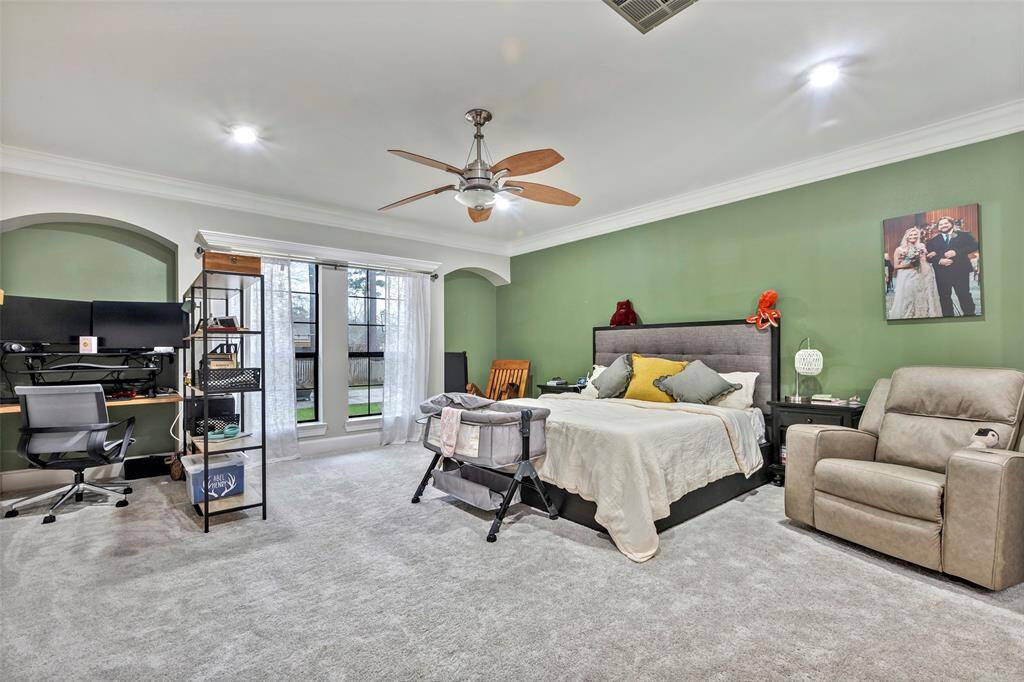 Escape to the primary retreat that is large enough to accommodate big furniture and a home office set up or sitting area. There is no shortage of usable square footage in this room!