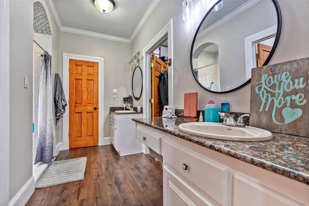 Separate vanities allow for plenty of counter space to hold all the necessities.