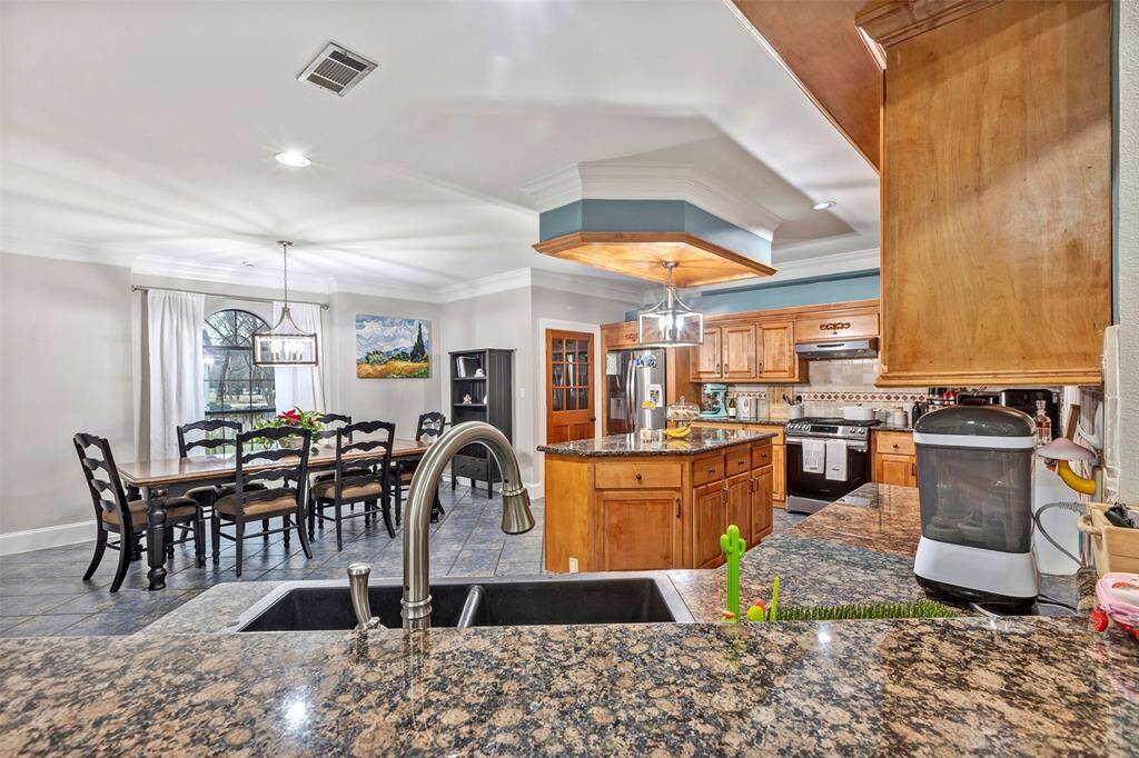 The kitchen/dining room combination means the cook never has to leave the party.