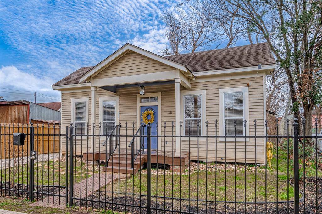 This charming updated bungalow has a fully fenced lot!