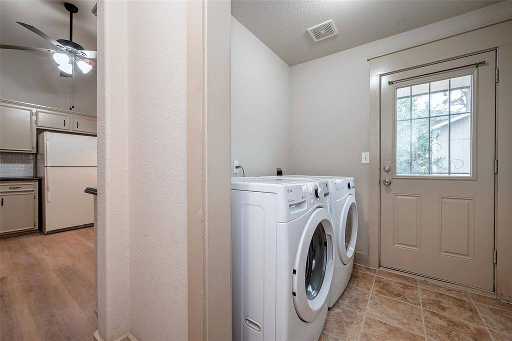 Back door and laundry just off kitchen! So nice to have it in the house!