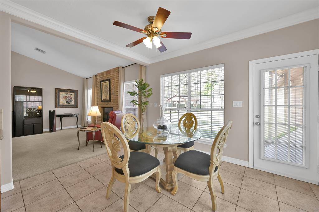 The  primary bedroom easily allows for a king-sized bed and additional furniture. Crown molding elevates the space. You can also wake up to views of your back yard through the double windows.