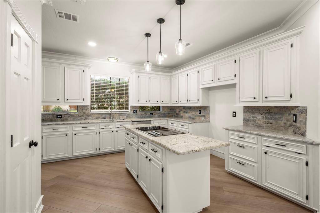 A massive walk-in pantry ensures ample storage, keeping your countertops clutter-free.