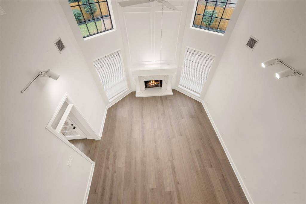 Whether gathering with family or unwinding by the fire, this elegant living room is designed for both comfort and style.