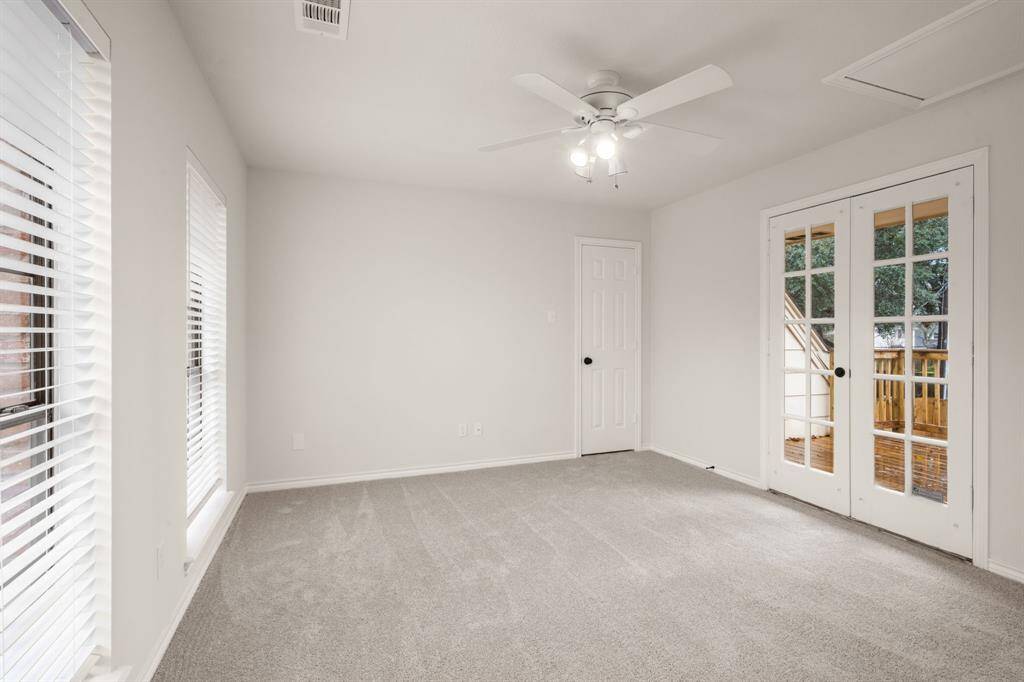 Each secondary bedroom is designed with comfort in mind, featuring soft carpet, ceiling fans, and ample closet space.