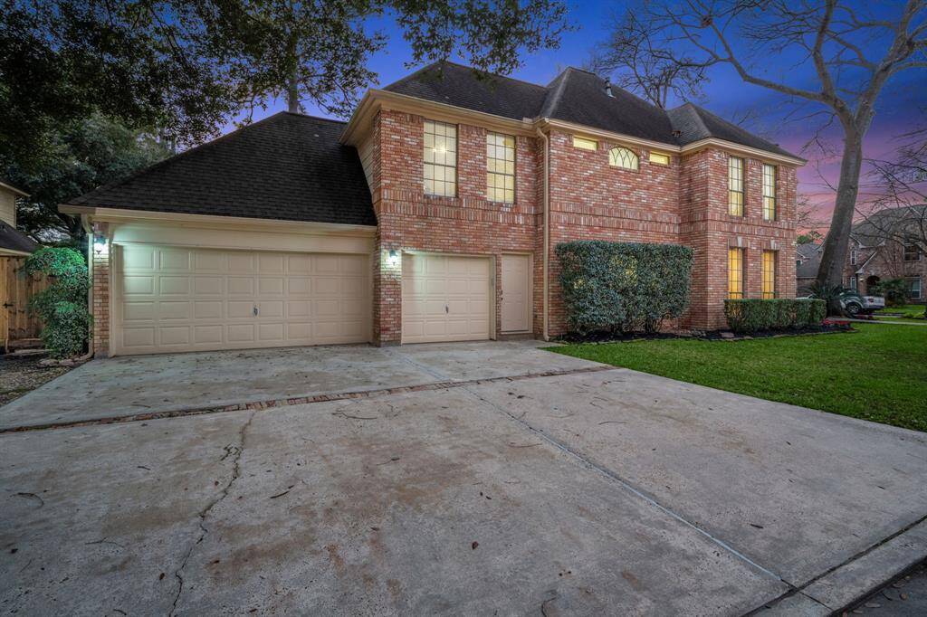 Three car garage with a three car driveway is the perfect amount of space for all of the drivers in the family.