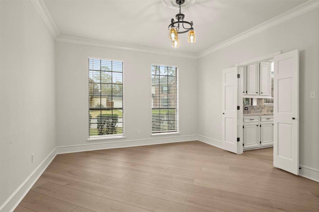 Elevate every meal in this stunning formal dining room, whether an intimate dinner or grand celebration, this space sets the stage for unforgettable moments.