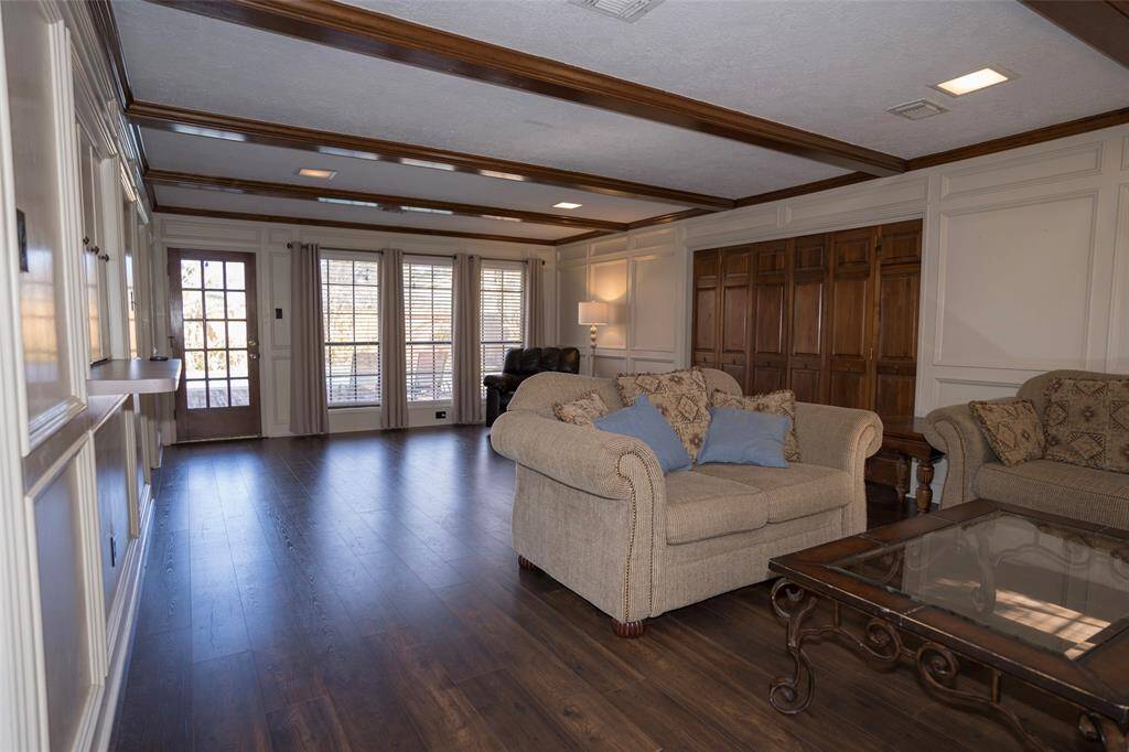 Inviting living room with stunning luxury vinyl plank floors, adding warmth and character to the space.