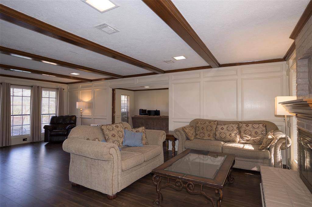 A cozy corner of the living room, perfect for relaxing or creating your own little retreat.