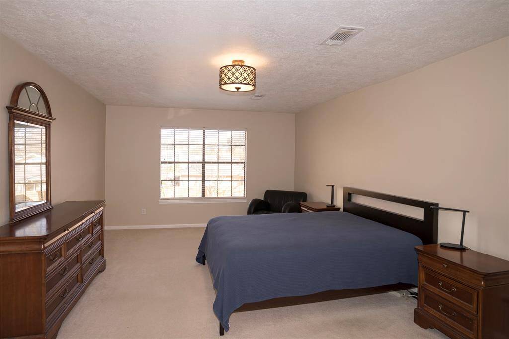 Imagine the possibilities—this spacious room is ready to be transformed with your personal taste and style.