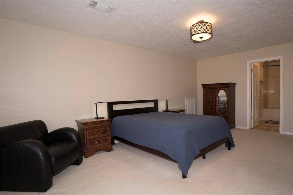 Additional view of the main bedroom.