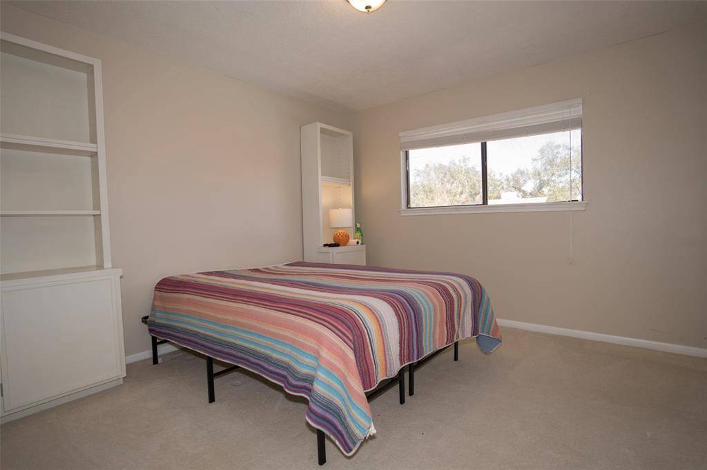 The third bedroom—cozy and ready to be transformed into your ideal personal space.