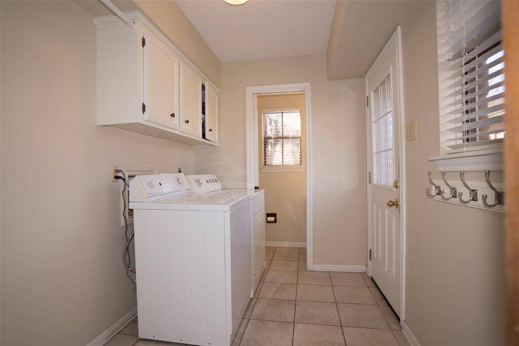 The laundry room, designed for convenience with plenty of space for your washing and drying needs.