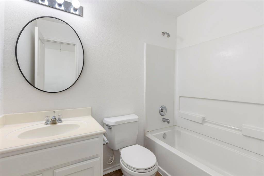 Two secondary bedrooms share a secondary bathroom.