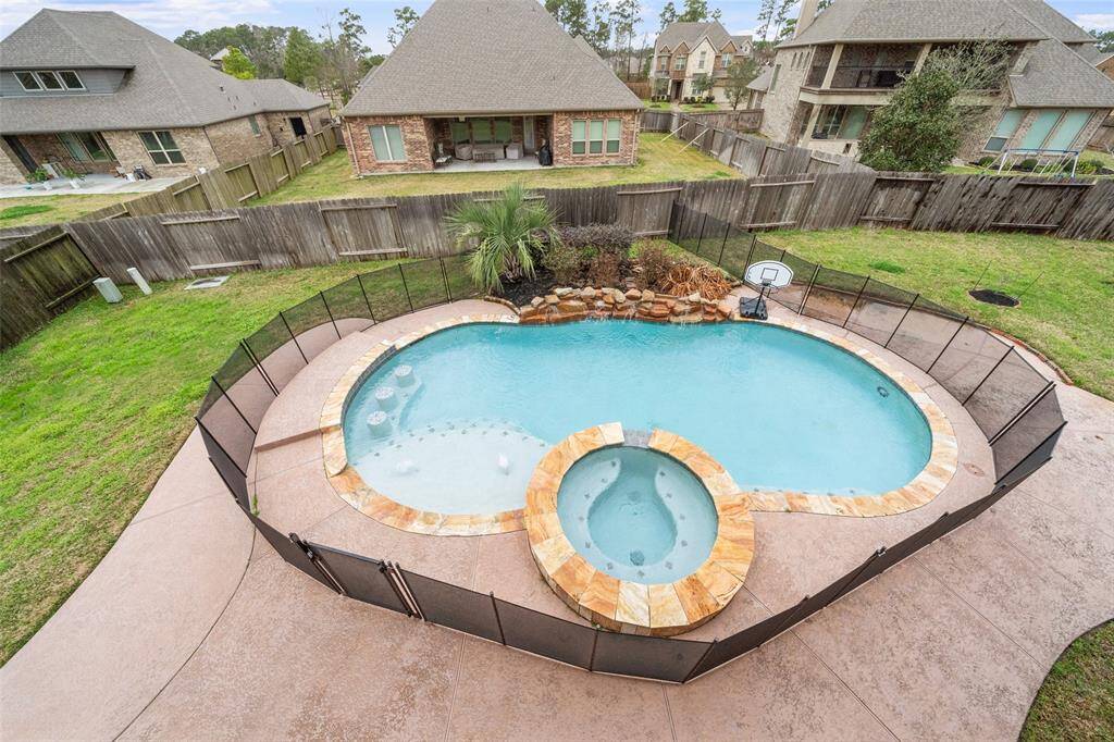 This is a huge yard.  There is large green space on both sides of the pool.