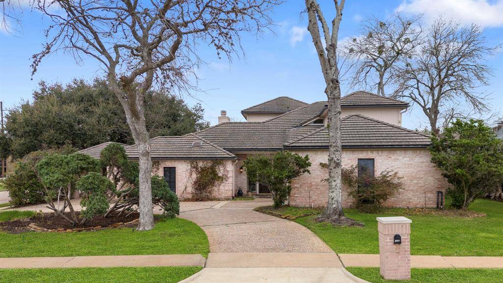 Gorgeous custom home on a corner lot!