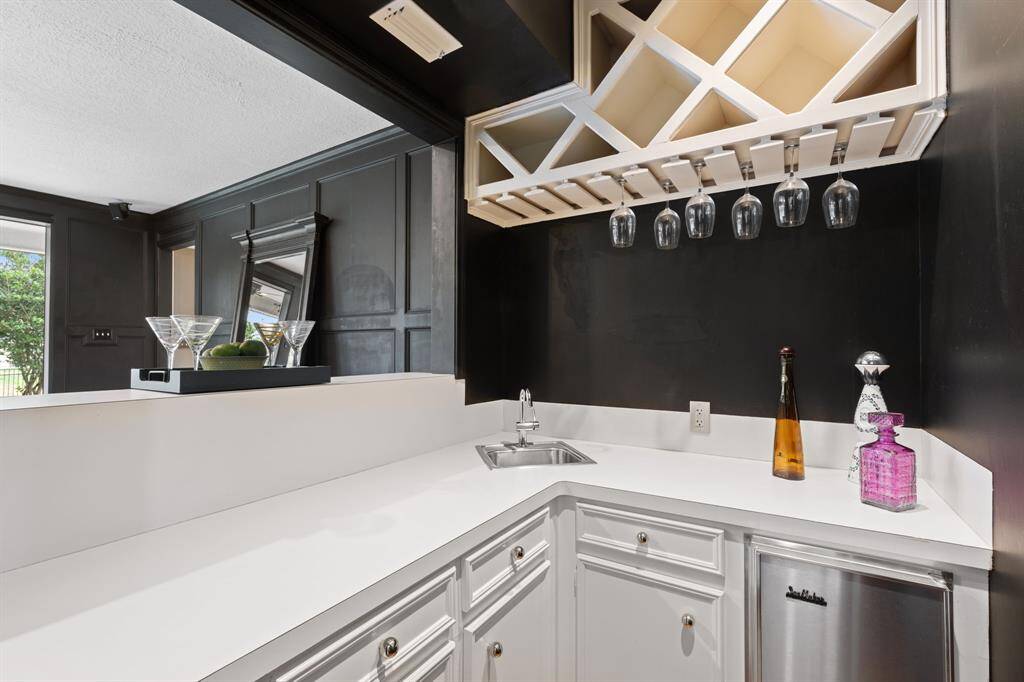 Imagine serving drinks from this great wet bar.