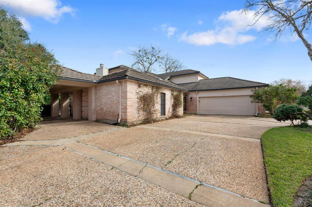 The carport is single-wide, but provides quite a bit extra parking and 3rd entrance to the driveway here.