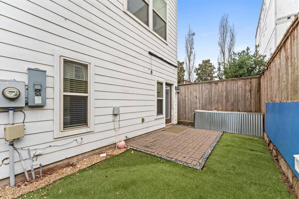 Perfect for intimate gatherings, the backyard provides a private outdoor retreat.
