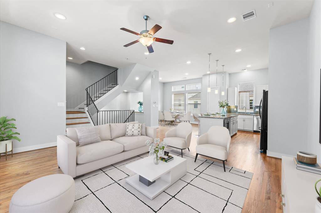 Designed for modern living, the second-floor open-concept layout seamlessly blends the kitchen, living, and dining areas.
