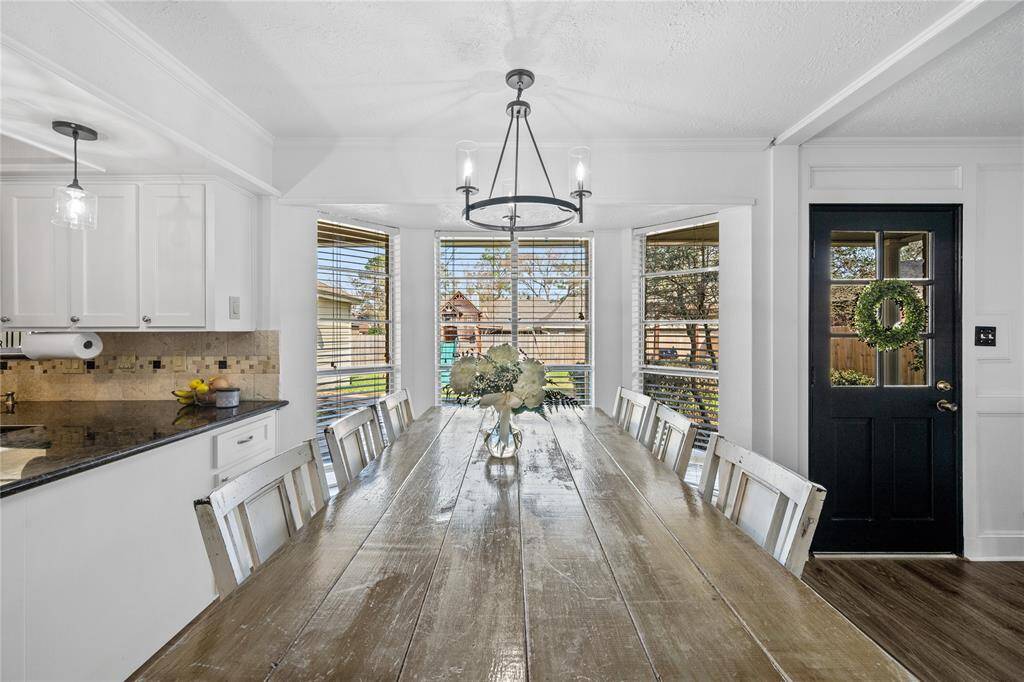Granite countertops & bay window to backyard & patio!