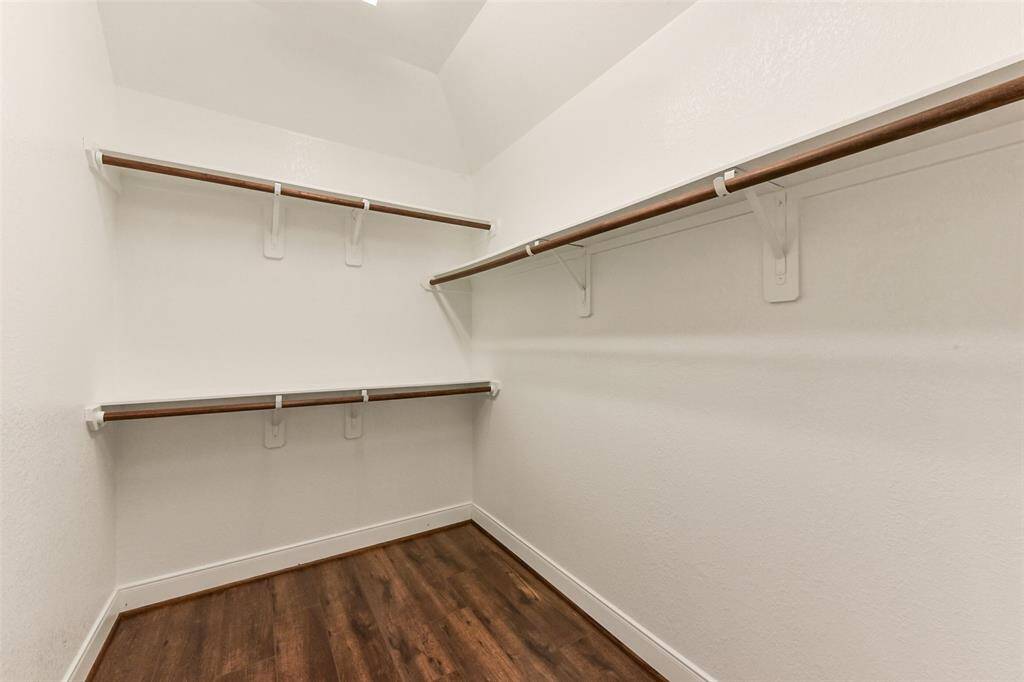 One of the two primary closets.