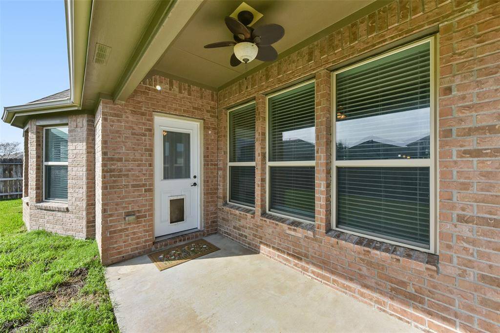 Covered Back Patio with breezy Fan