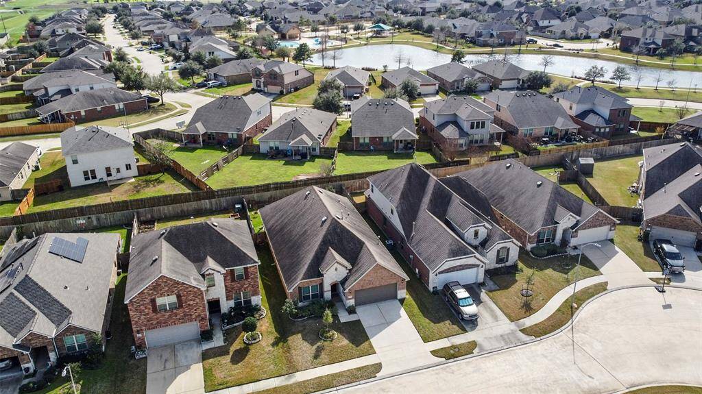 Looking over the front of the home toward the community park and pools, more lakes!
