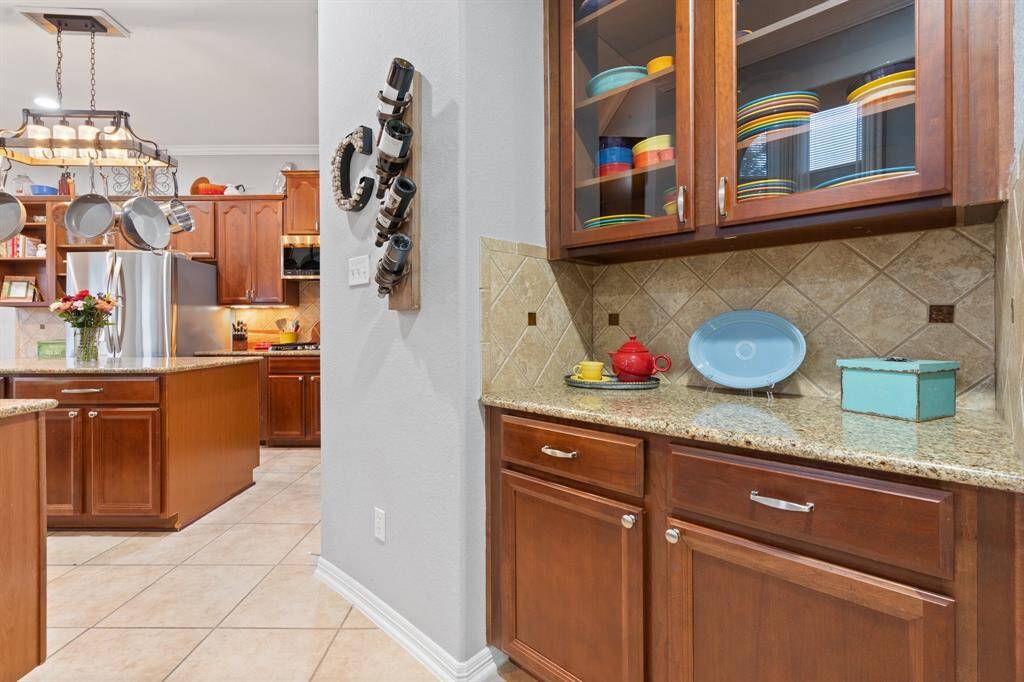 The home includes dry bar/butler pantry for extra storage.