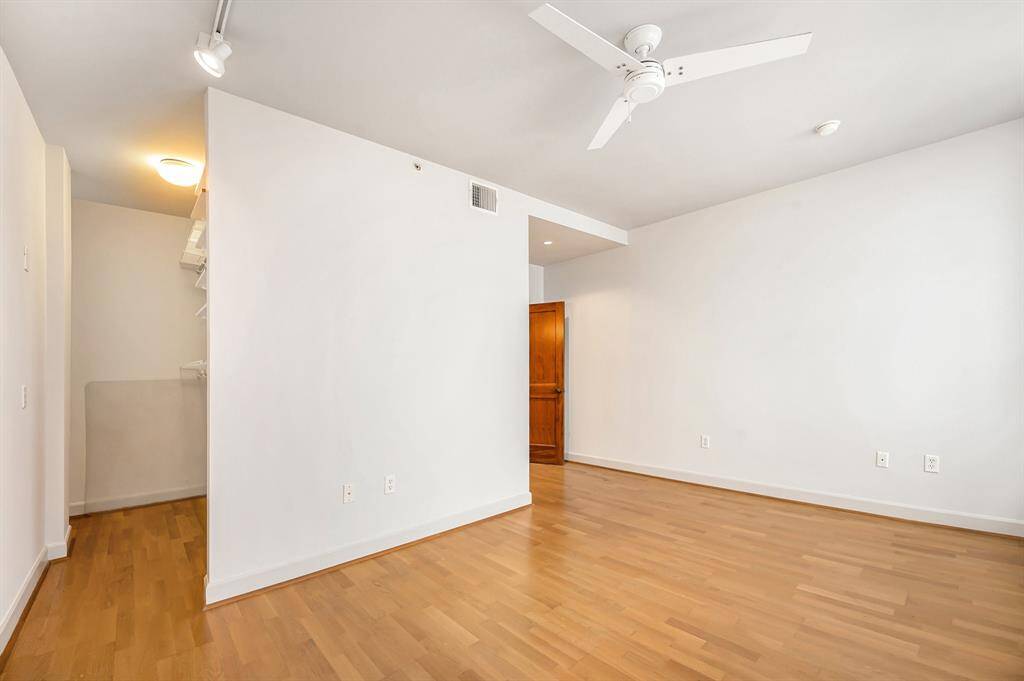 There is an open closet area to the left, but concealed as you enter the bedroom. The space is versatile for various layouts and furniture arrangements.