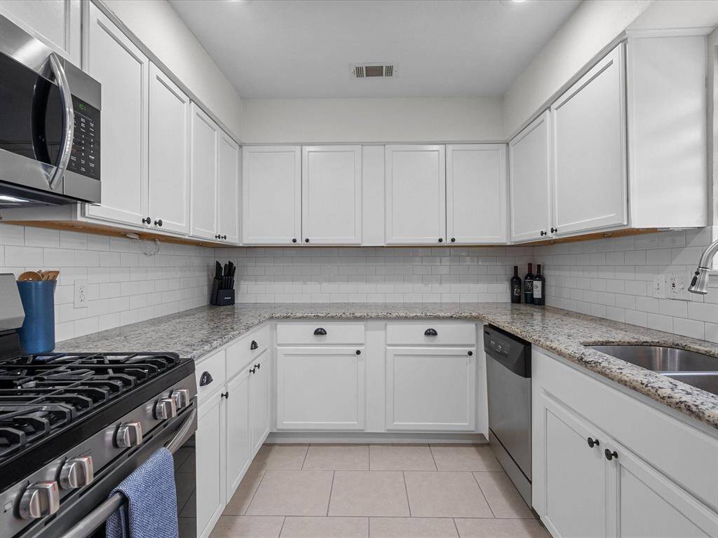 Another view of the kitchen