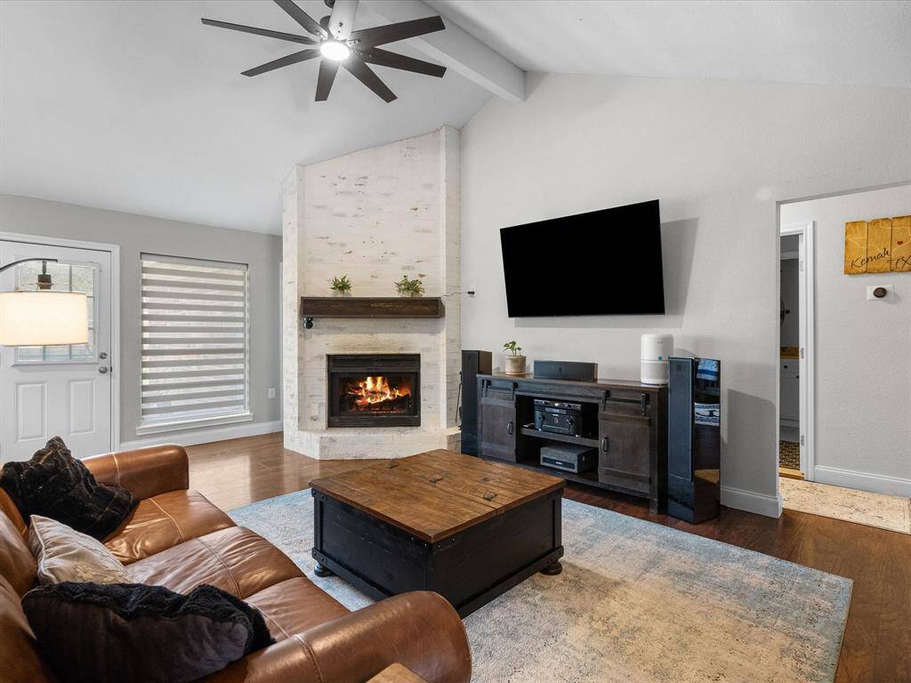 A beautiful fireplace pulls the home together