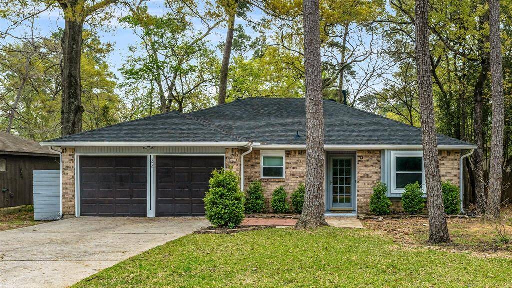 NEW ROOF! NEW ROOF INSTALLED 3-21-2025! LOCATION! Up front of the Woodlands and convenient to Hughes Landing, the Woodlands mall, Exxon campus, hike and bike trails and highly sought after schools! This charming single-story brick home features a two-car garage and a welcoming front yard with mature trees, offering a blend of privacy and curb appeal.