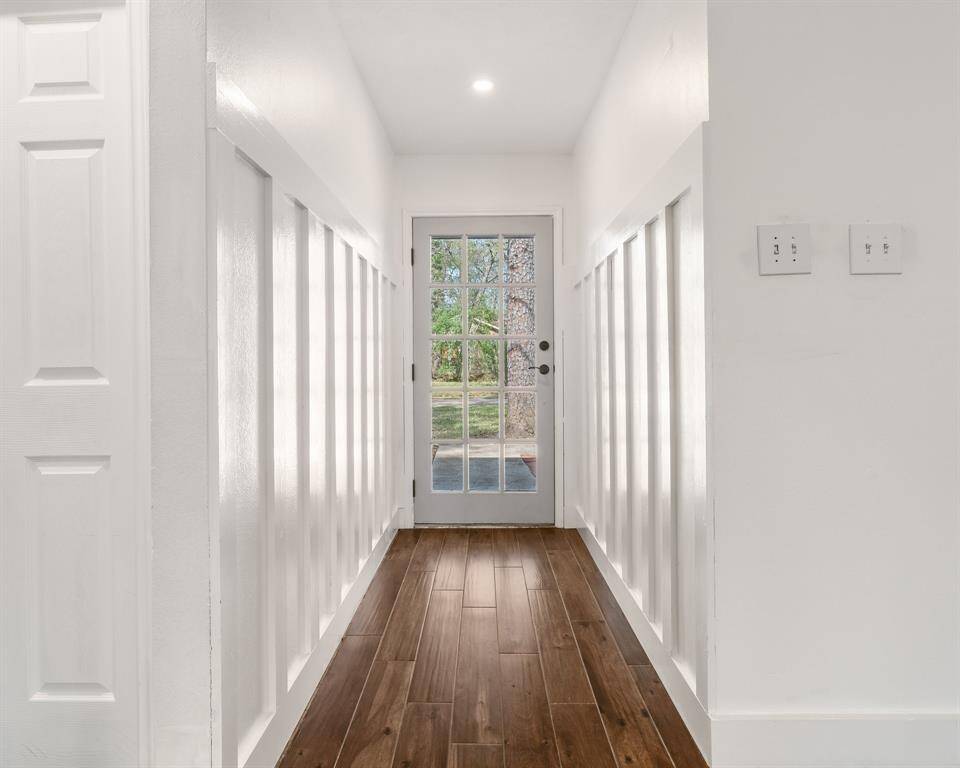 Beautiful wainscoting greets you as you enter the front door along with wood like tile throughout the home for easy maintenancd!