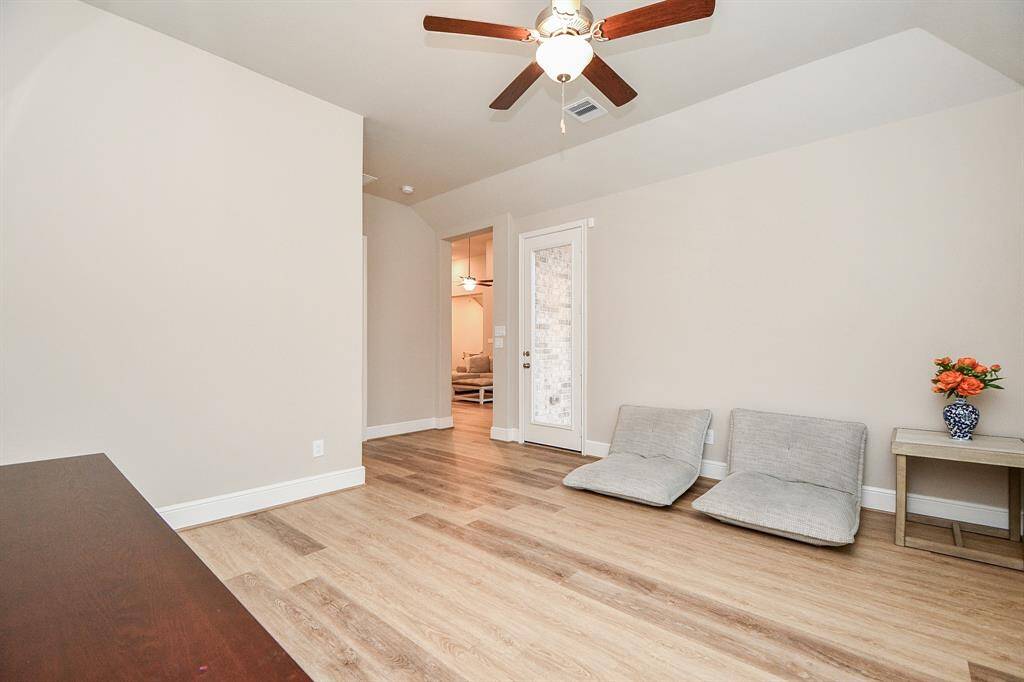 Another view of the gameroom. The glass french door opens to the covered patio.