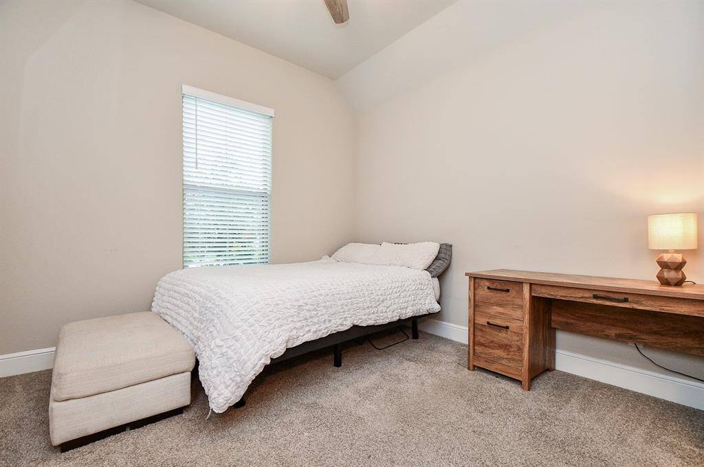 Second bedroom is facing the front of the home.